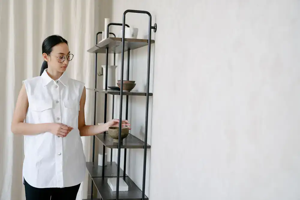 A neat display of designer frames on a minimal shelving unit