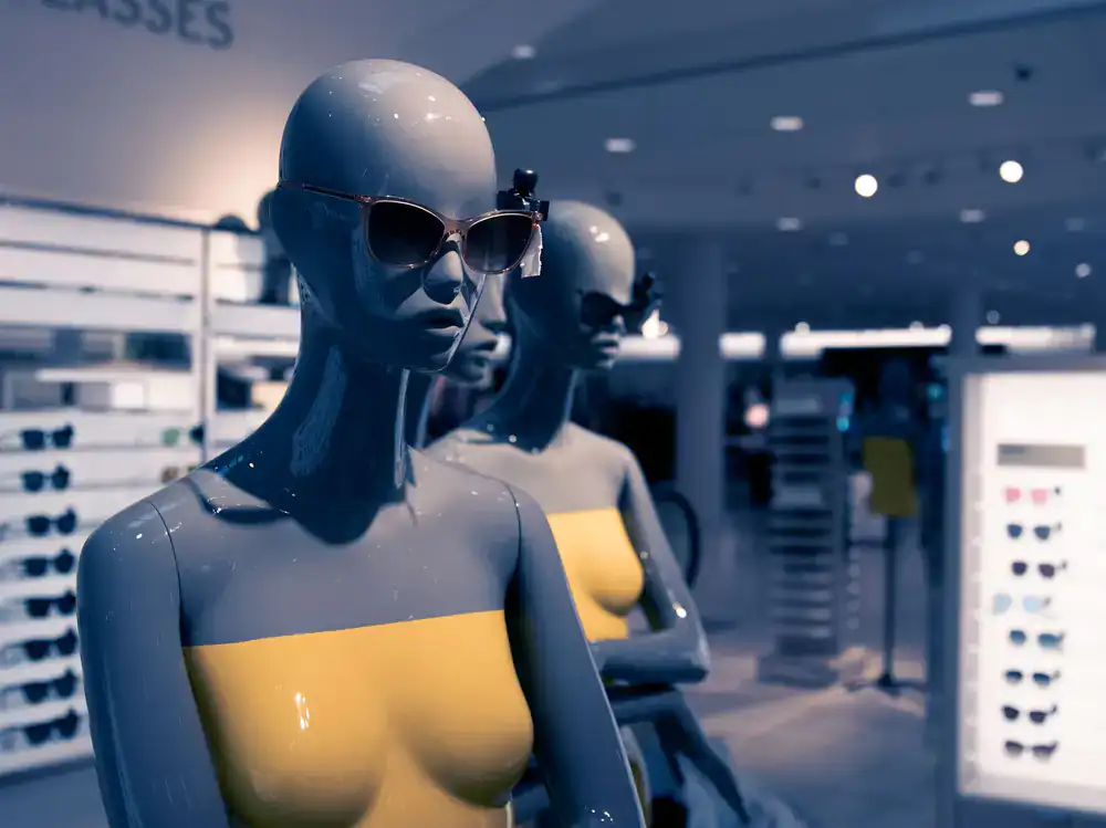 Designer sunglasses on a display stand