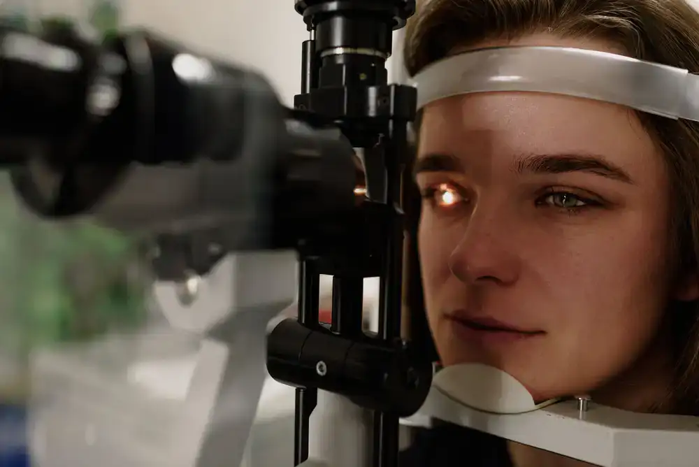 Optometrist performing a clinical eye examination